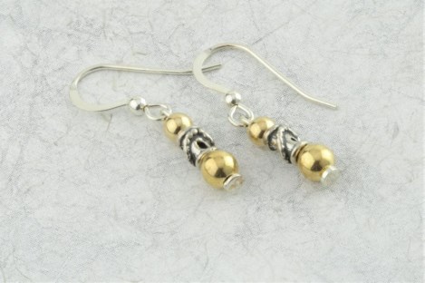 Gold and silver drop earrings | Image 1