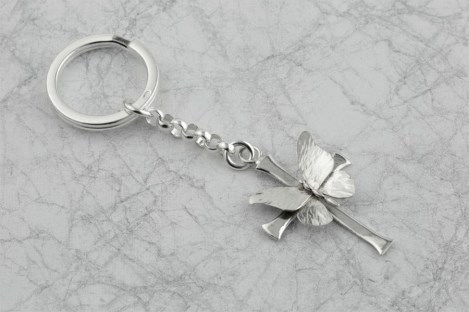 Sterling silver butterfly cross keyring Was £95.00  Now £75.00 | Image 1